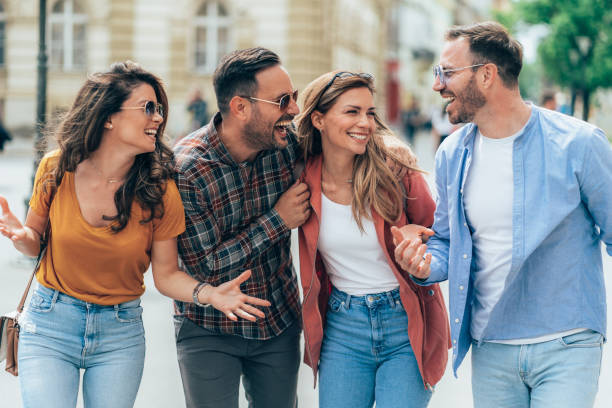istock Friends having fun outdoors in the city 1471543976