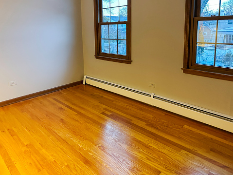 Old, scratched hardwood floor before refinishing