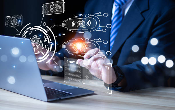 istock man hand working with modern laptop computer in modern office with virtual icon diagram, man Chat with AI, Artificial Intelligence. man using technology smart robot AI, artificial intelligence. 1471545924