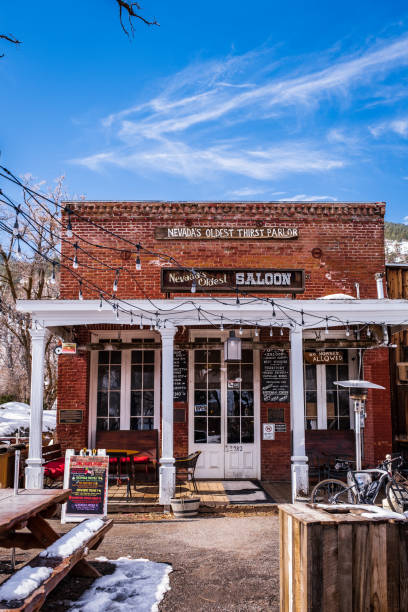 Genoa, Nevada - February 10, 2023: Built in 1853, historic Genoa Bar & Saloon is at 2282 Main Street. According to their website, the saloon has had many famous actors and musicians visit, including: Willie Nelson, Charlie Daniels, Merle Haggard, Waylon Jennings, Johnny Cash, Slim Pickens and John Denver.