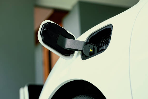 istock EV car plugged-in with cable from progressive home charging station. 1471556133