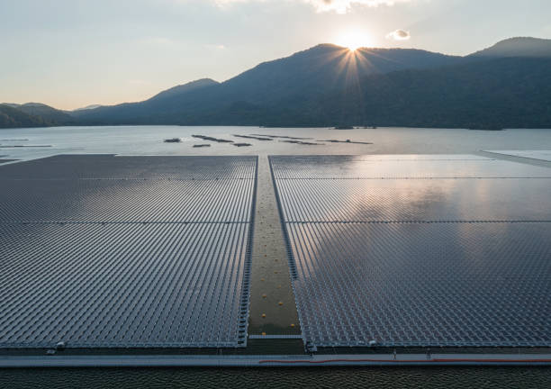 Floating Solar Energy Farm A floating solars farm in the lake of Da Nhim, Binh Thuan province, central south of Vietnam floating electric generator stock pictures, royalty-free photos & images
