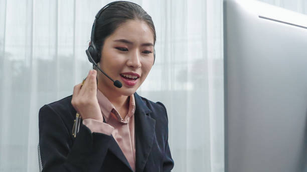 istock Enthusiastic female operator provide helpful customer service to customer. 1471560208