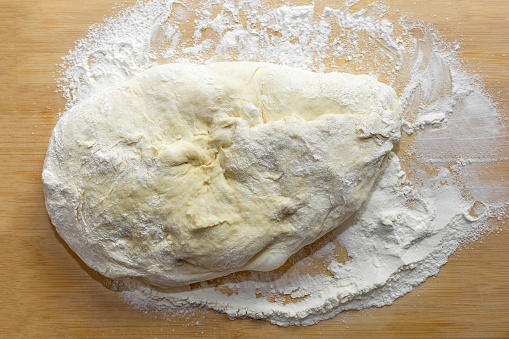 Prepared dough for baking a pie made of wheat flour