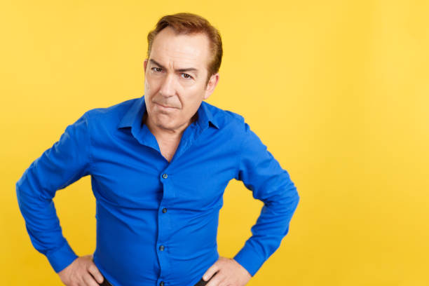 istock An angry mature man looking at the camera 1471564963