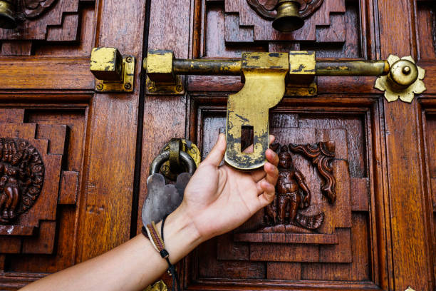 istock Man holds hand door handle or knocker 1471565552