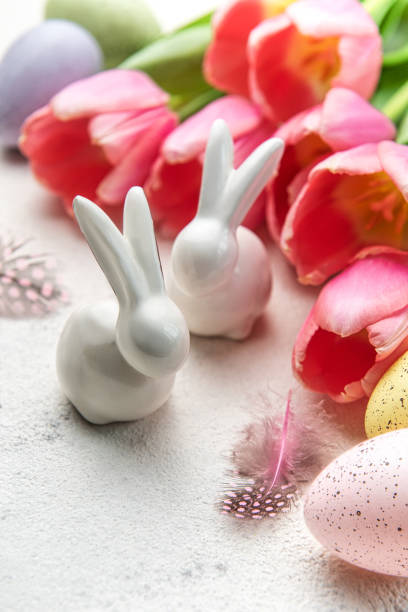 istock A bouquet of tulips, Easter bunnies and eggs. 1471567862