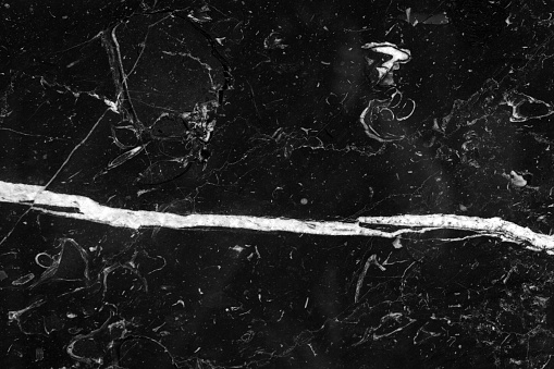 Black and white marble Nero Marquina texture. High resolution photo.
