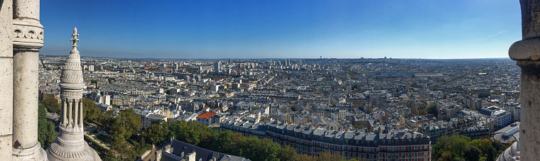 Aerial view of Paris with its typical buildings. Paris is a global center for art, fashion, gastronomy and culture.