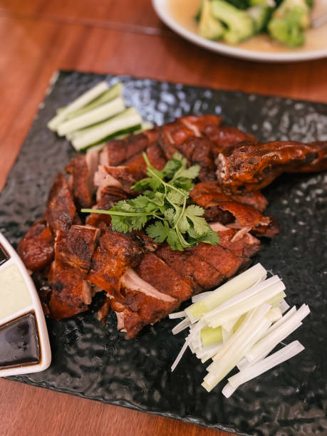 istock Roast duck served on a black square plate 1471585378