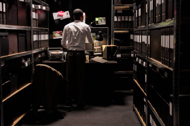 istock Investigator analyzing detective board, brainstorming to solve crime case 1471586172