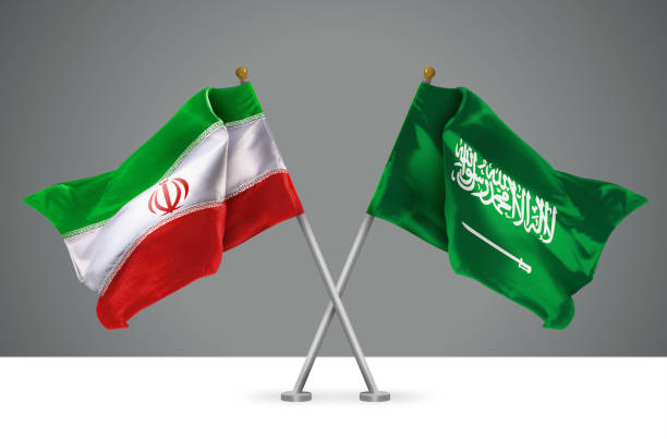 3D illustration of Two Crossed Flags of Iran and KSA stock photo