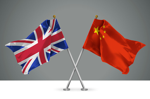 3D illustration of Two Wavy Crossed Flags of China and United Kingdom UK, Sign of Chinese and British Relationships