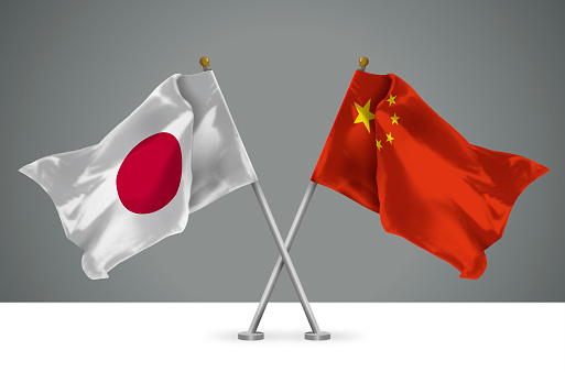 3D illustration of Two Wavy Crossed Flags of China and Japan, Sign of Chinese and Japanese Relationships