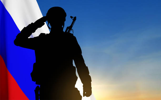 istock Silhouette of Russian soldier on background of sunset 1471594139