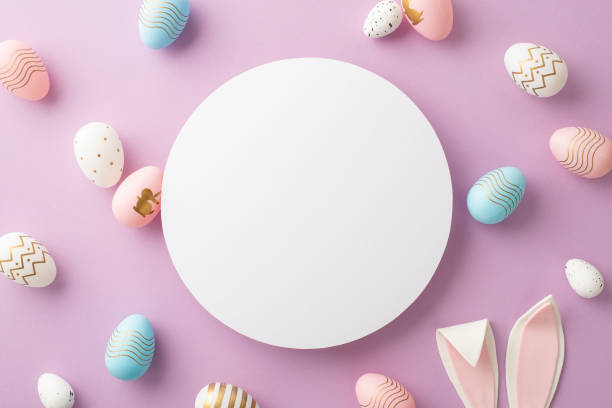 istock Easter concept. Top view photo of white blank circle colorful easter eggs and easter bunny ears on isolated lilac background with empty space 1471595025