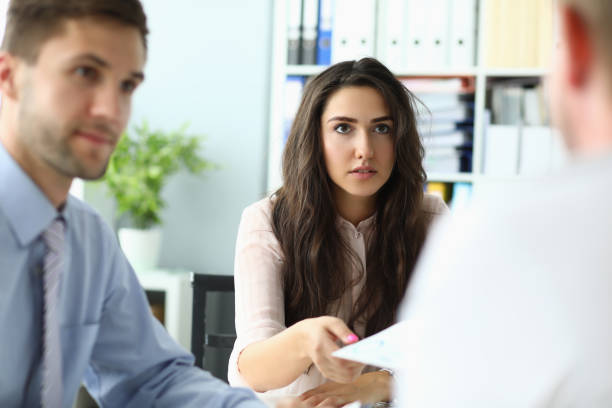 istock Three colleagues are discussing a new business project in office 1471599831