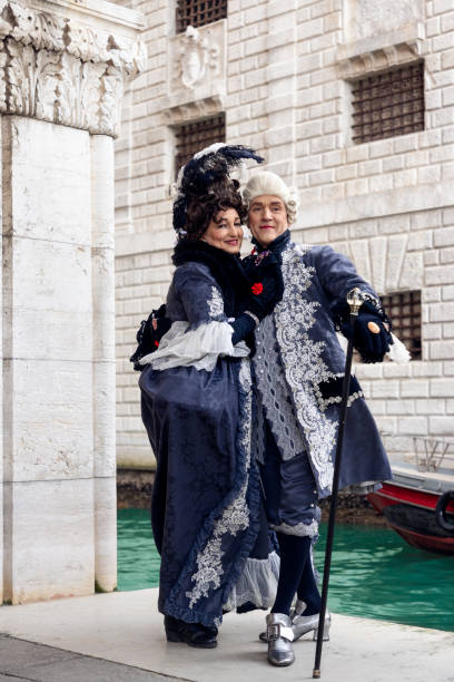 casanova and his lady at the venice carnival in historical costumes - holidays and celebrations shadow italy venice italy imagens e fotografias de stock