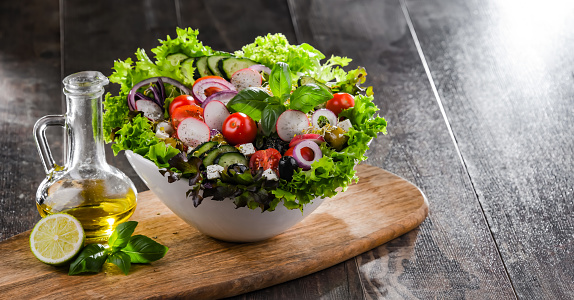 Composition with a vegetable salad bowl. Balanced diet.