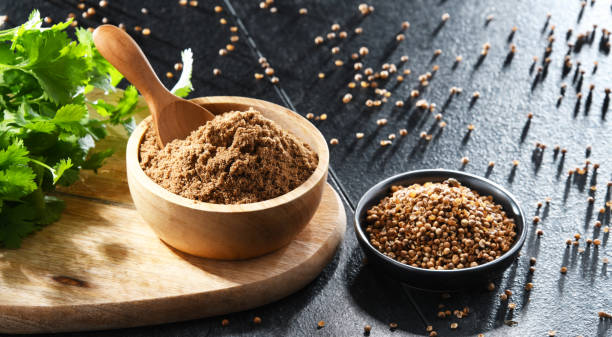 istock Ground coriander, its dried seeds and fresh leaves 1471604991