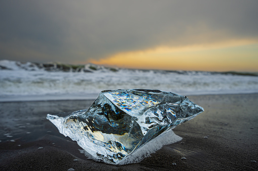 Jewelry Ice. The crystal clear ice is a jewel-like color in the sunlight. Otsu Coast, Toyokoro-cho, Hokkaido, Japan. 2023