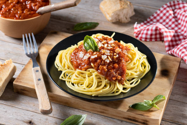 istock Spaghetti with bolognese sauce on wooden table 1471612321