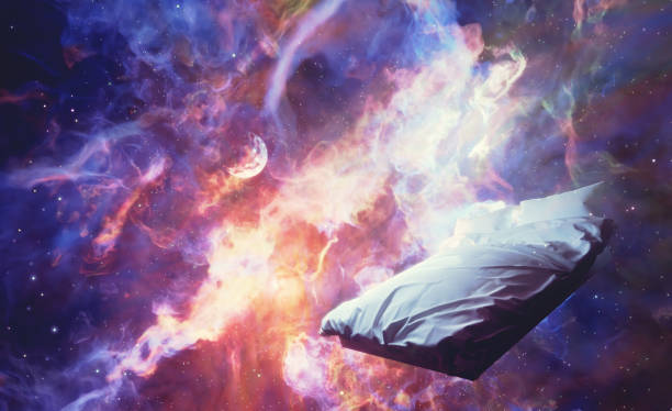 istock Sleeping and dreaming fantasy dreams. Bed immersed in universe 1471618740
