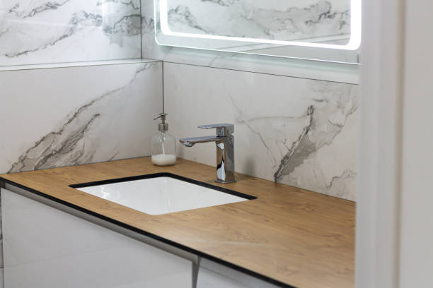 istock Marble bathroom interior with sink, faucet and mirror 1471622157