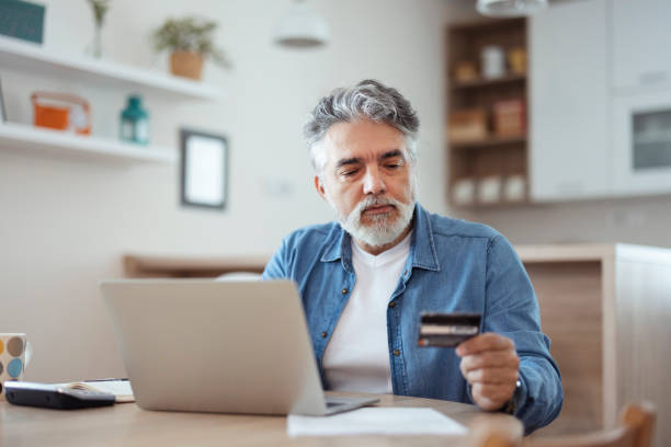 istock Credit Card Payment on a Laptop 1471622439