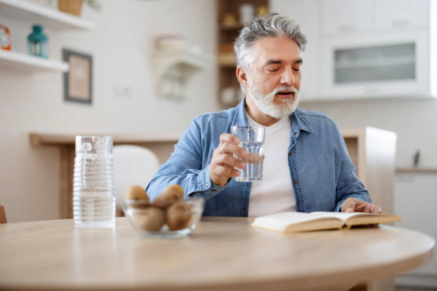 istock Reading Novel With Glass of Water 1471622492