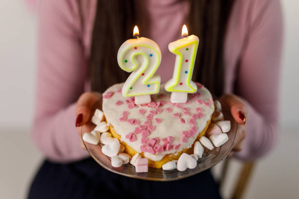 A Delicious Celebration A Close-Up Shot of a Birthday Cake with Festive Decorations. 21st birthday stock pictures, royalty-free photos & images