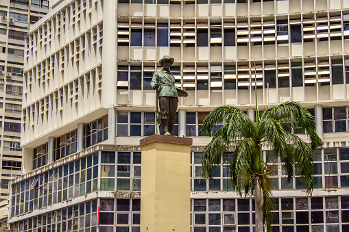 Goiania, Goias, Brazil – March 04, 2023: The monument to the bandeirante with a building in the background, at the intersection of Avenida Anhanguera and Avenida Goias in Goiania. by Armando Zago.