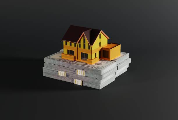 istock House model on a bundle of banknotes, money. 1471630122