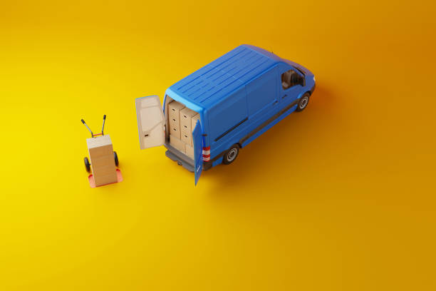 istock Commercial delivery blue van with cardboard boxes on yellow background. 1471633683