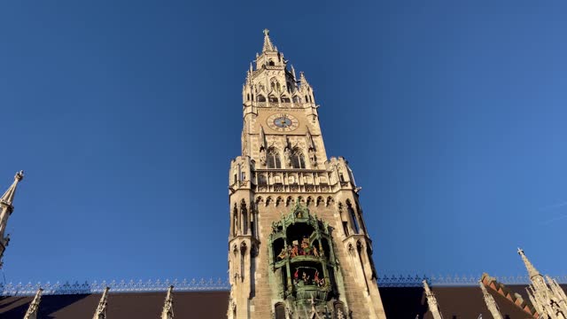Figures moving at Rathaus Glockenspiel clock tower in Marienplatz in Munich