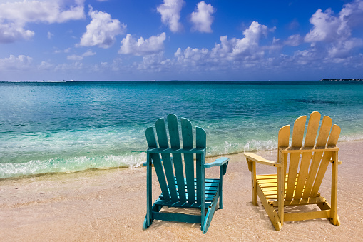 Wooden chairs on the beach