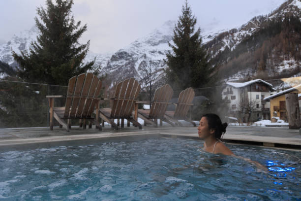 istock Lady relaxing in hot water SPA pool in Mont Blanc 1471636492