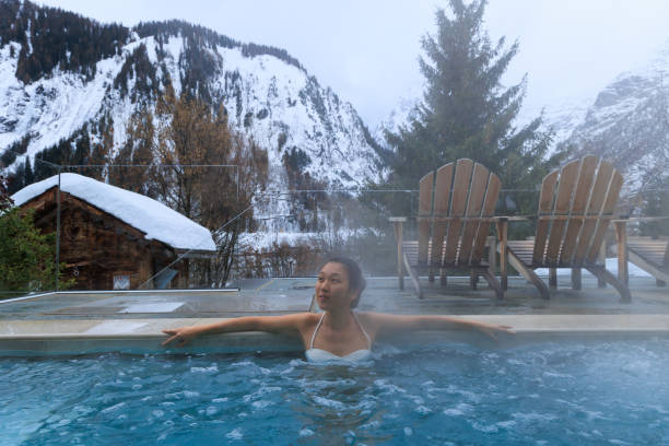 istock Lady relaxing in hot water SPA pool in Mont Blanc 1471636503