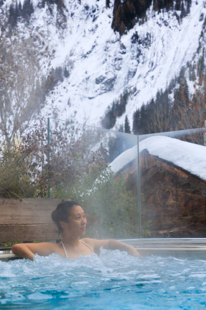 istock Lady relaxing in hot water SPA pool in Mont Blanc 1471636511