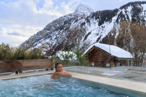 istock Lady relaxing in hot water SPA pool in Mont Blanc 1471636514