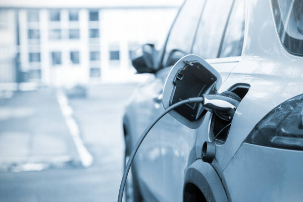 istock Electric Car Charging At Power Station 1471645313