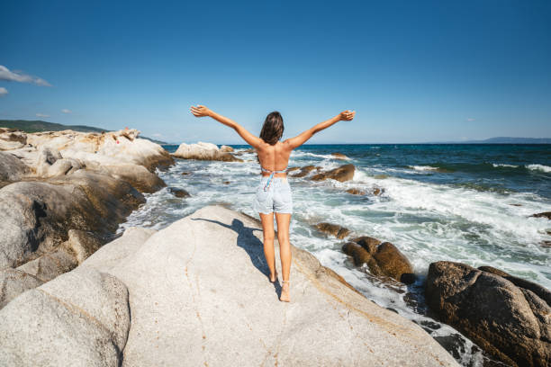 Happy youg woman on a summe vacation.