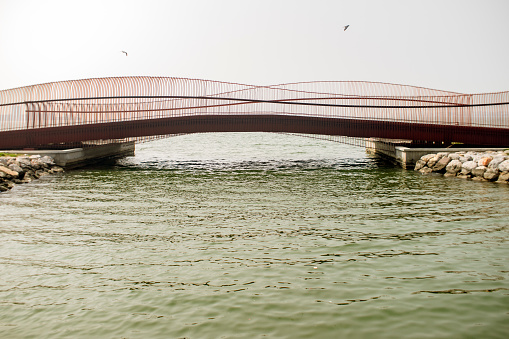 View of a pedestrian bridge on water pass in Izmir, Turkey.