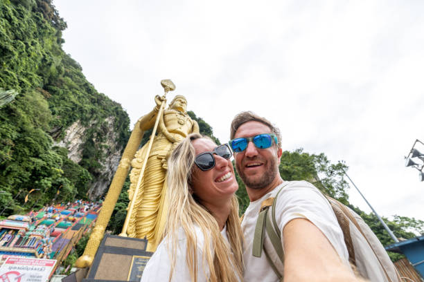istock Couple taking selfie at temple in Malaysia 1471648512