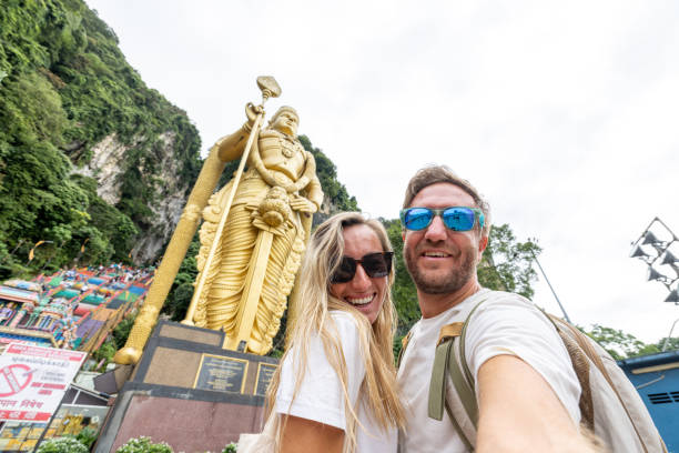 istock Couple taking selfie at temple in Malaysia 1471648983
