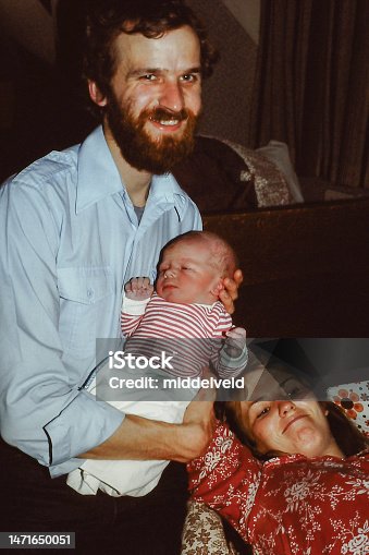 istock Young family with new born baby back in time 1471650051
