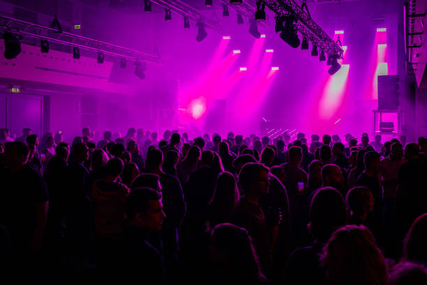 istock Audience in front of a stage Silhoutte 1471650056