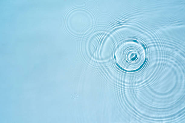 istock Background with round rings on the water surface, aqua texture 1471651084