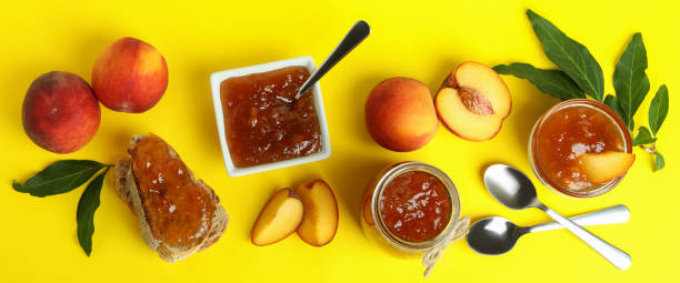 istock Peach jam and ingredients on yellow background 1471651494