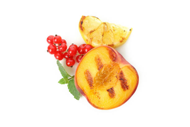 istock Tasty grilled peach isolated on white background 1471652799